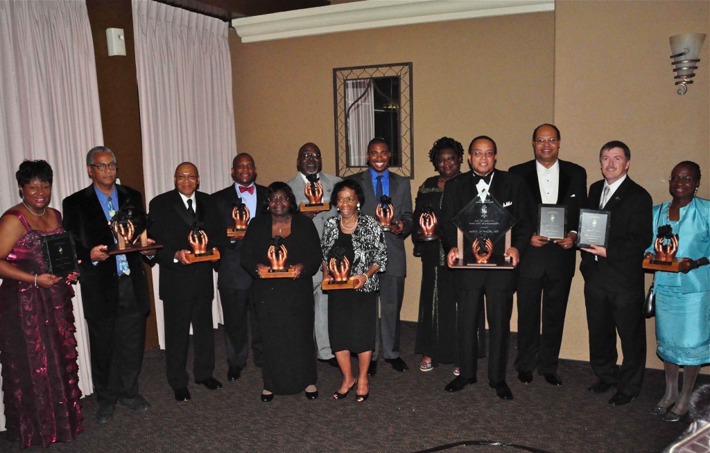 Photo caption:  Honoring some of the unsung heroes who have worked diligently to improve the lives of others throughout the Inland Empire, The Black Cultural Foundation awarded the 2011 Black Rose Award to the following award community advocates: (back row left to right) Juanita Dawson, James Butts, Jimmie Brown, Herb English Jr., John Futch, Mark Campbell, Vicki Lee, Carl Dameron, Timothy Evans from The Unforgettables Foundation, Dr. Queen Hamilton, (left to right front row) Geraldine Reaves, Jennifer Vaughn-Blakely and Dr. Harold Cebrun. Photo by Chris Sloan. 