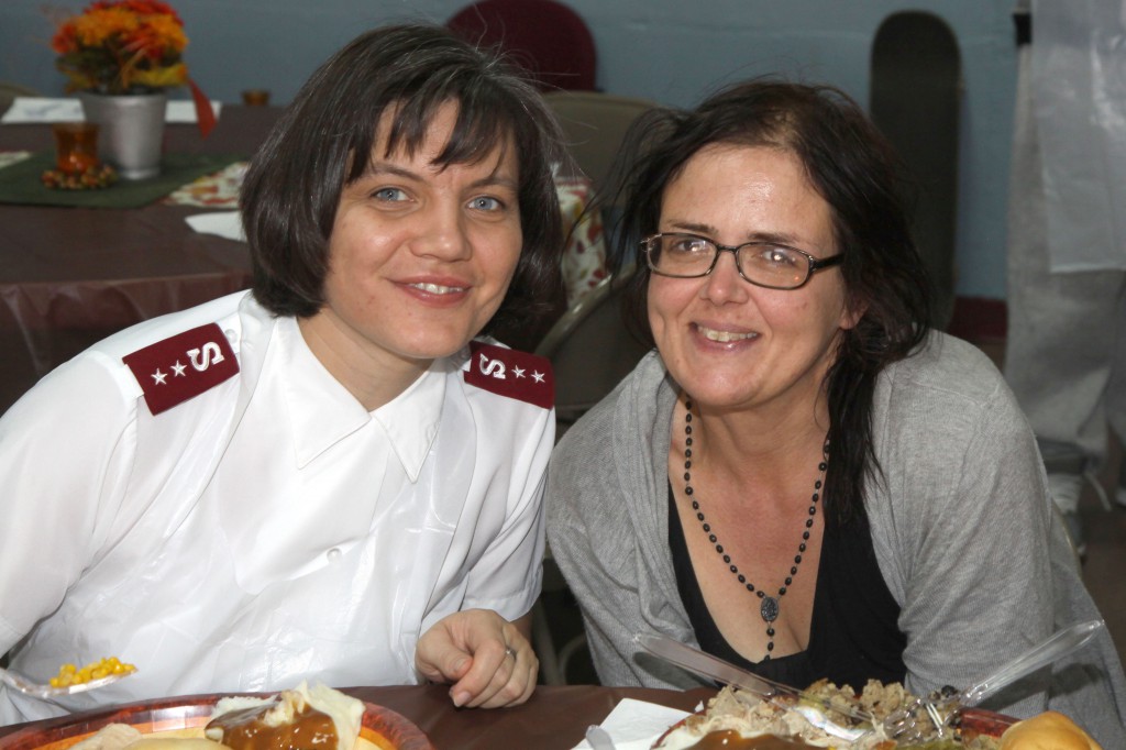 Captain Anya Henderson, Corps officer fellowships with Aurora Captain meal patron. 