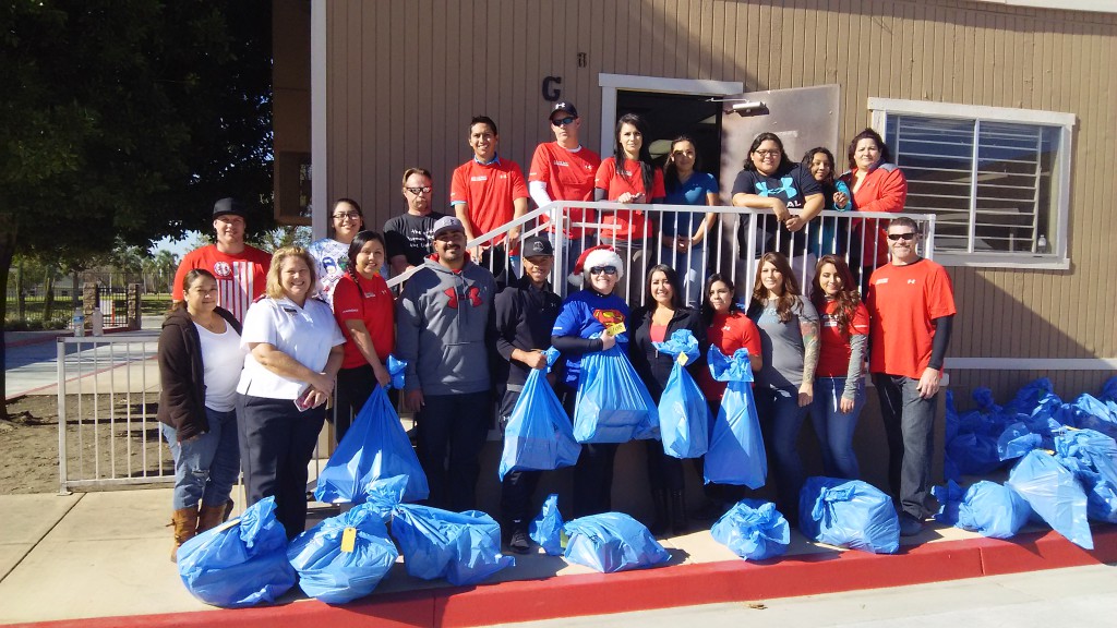 "The Salvation Army and a group of more than 20 community volunteers handed out food and toys to 455 families with about 1,400 children on Thursday, Dec. 17 and Friday, Dec. 18. The crew helping with this distribution included (front row), Lorena Montero, Lt. Kathleen Griffiths (assistant corps officer), Sara Lopez, Alfredo Lemus, Jeremiah Hamilton, Mara Koebel, Monica Ramos, Maria Otero, Michelle Osborn, Dulce Gonzalez, Jay Matthew (back row), Trevor Bierns, Monica Ayala, Emanuel Cribley, Jose Mota, Vince Estebeme, Jacqueline Cortes, Jennifer Quiroga, Maricruz Tafoya, Michelle Rosales, and Rosalinda Soto.