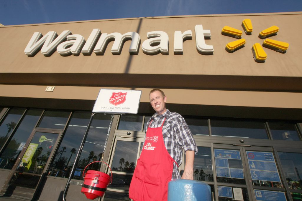 Photo 1 IMG_144 Shey Walmart: Mr. Shey Holden takes his post at the front of the Walmart on Mt. Vernon Ave. in Colton. Shey is a volunteer with The Salvation Army, and is planning on giving at least 30 hours this season. Photo By Ricardo Tomboc 